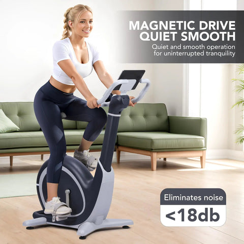 Person exercising on Indoor Magnetic Exercise Bike With AI Driven Personalization, Built In App, 350 lbs Capacity, 2 in 1 LCD Monitor.
