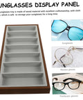 Premium Wooden Shade Keeper Tray Including Seven Gray Fabric Slots Top Tier Jewelry Glasses Watch Organizer viewed from above.