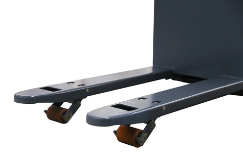 Heavy Hitter Walker Electric Pallet Truck Comes With Zero Hassle Maintenance Free Batteries That Move Four Thousand Four Hundred Pounds Smoothly Through Warehouses And Commercial Sites, showing pallet forks with wheels.