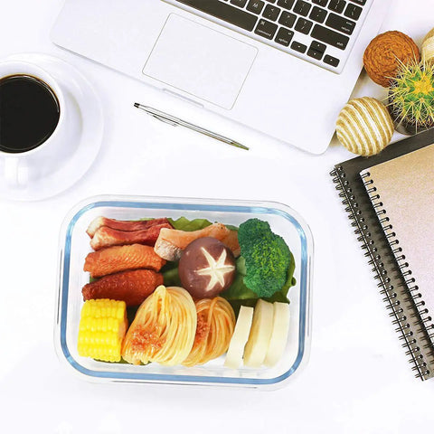 Eight Pack 30 Oz Glass Meal Prep Containers with Airtight Lids Glass Food Storage for Lunches shown with laptop and coffee