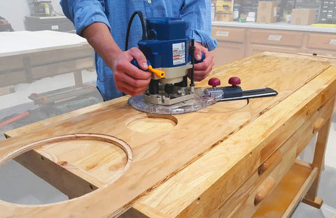 Adjustable Circle Cutting Guide Set Featuring Built Tough Metric And Imperial Scales For No Sweat Precision Cutting With Top Shelf Inside Outside Router Templates For Custom Woodworks in use on wood.