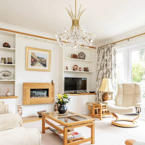 Glam Gold 13 Bulb LED Pendant Light Chandelier With Crystal Flower Shade in a modern living room.