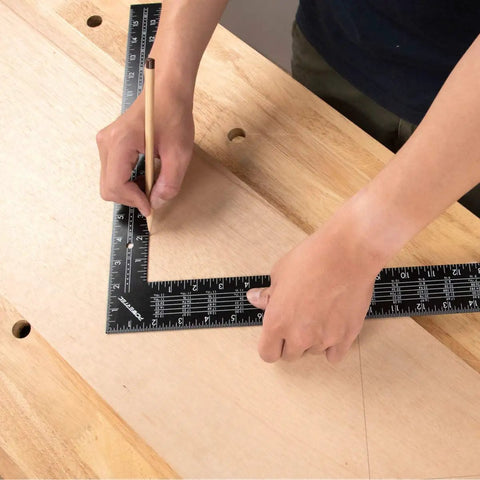 Person using Must Have Pro Grade 16 By 24 Steel Framing Square With Rafter Tables For Woodworking And Construction on wooden surface