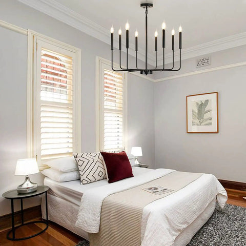 Modern bedroom featuring Eight Light Modern Black Farmhouse Chandelier For Dining Room Living Room Kitchen Foyer And Bedroom With Candle Style Illumination And 360 Degree Lighting For High Ceilings This Dope Fixture.