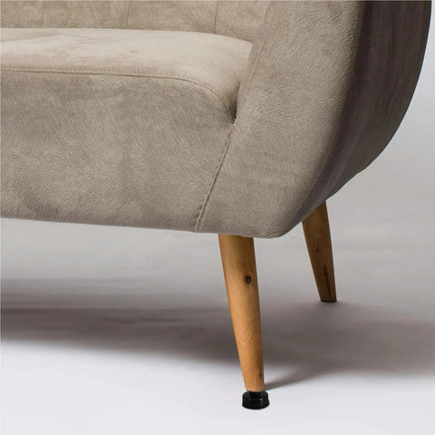 Close-up of a sofa leg with heavy duty adjustable furniture leveler with threaded screws feet, stable load on carpet.
