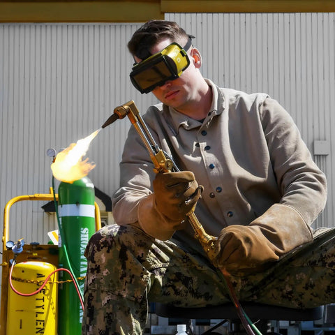 Person using Oxygen And Acetylene Regulators For Medium Duty Welding Torch CGA540 CGA510 Compatible With 9/16 Inch 18 Outlet