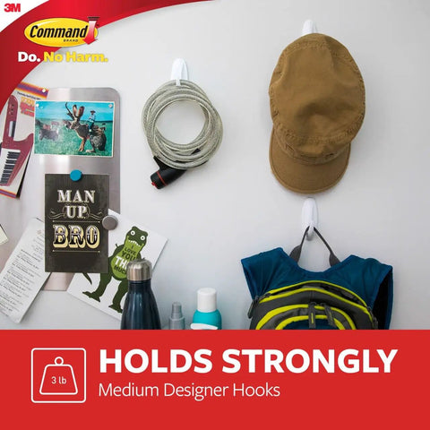 Damage Free Wall Hooks Set With Strips holding hat, rope, and bag, demonstrating use on painted wall, holds up to 3 lb strongly