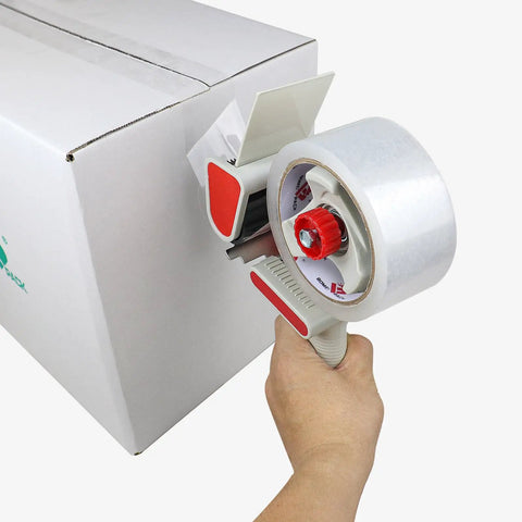 Heavy Duty Packing Tape Dispenser With Clear Shipping Rolls Quick Release Tape Gun in hand, taping a cardboard box.