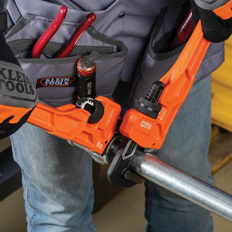 Plumber using 14 Inch Cast Iron Pipe Wrench Heavy Duty Adjustable Plumbing Wrench With I Beam Handle Extending Jaw on pipe
