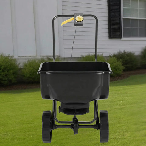 Outdoor Broadcast Lawn Spreader 70 Lbs Capacity Walk Behind Push Spreader With Hopper Grate And Wheels on Lawn