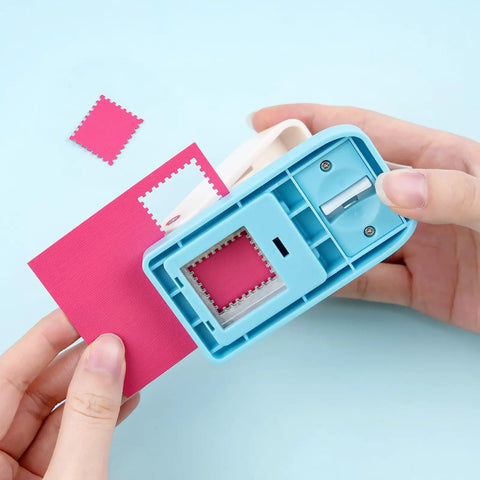 Using a Rectangular Postage Stamp Punch 1x0.8 Inch With Scalloped Edge, Lever Action Paper Punch for crafting on pink paper.