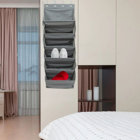 Straight Up Game Changer Over The Door Shoe Rack With Six Roomy Pockets To Keep Your Entryway Sleek Features heavy duty steel clips and weather proof fabric, gray with sneakers and shoes.