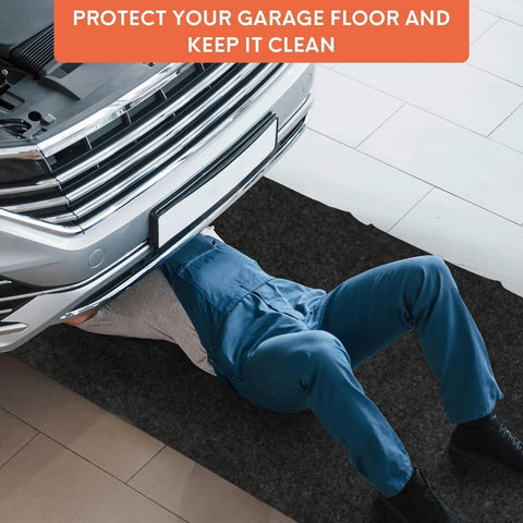 Mechanic working under car on Two Pack 36 By 60 Inch Oil Spill Mat For Driveway And Garage Floor, Absorbent Polyester Oil Pad.
