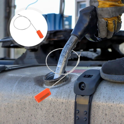 Heavy Duty Orange Steel Wire Cable Seals With Forty Pieces Tamper Resistant Bolt Locks To Keep Shipping Containers And Cargo Trailers Locked Down Tight For Industrial Haulage And Water Meter Valves in use on a water meter.