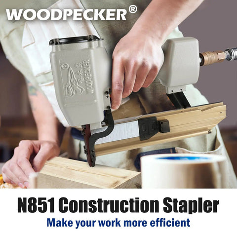 Sixteen Gauge Seven Sixteenth Inch Medium Crown Construction Stapler in use, showing all-metal build and aluminum housing