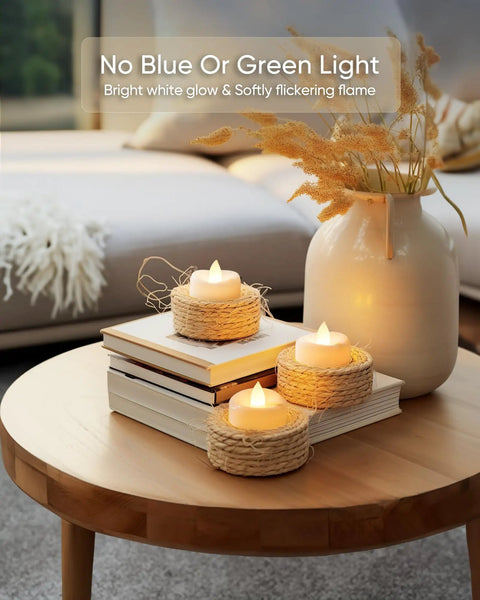 Bulk 100 LED Tea Lights Battery Operated Flameless Tealights displayed on books and table for decor
