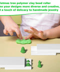 Child using Christmas Tree Polymer Clay Bead Roller Set With 2 Rolls For Modeling Clay, creating small green tree beads for crafts