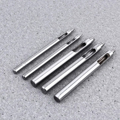 Leather Hole Puncher Set Five Piece With Steel Hollow Round Punch Tools 1-5mm arranged on gray surface