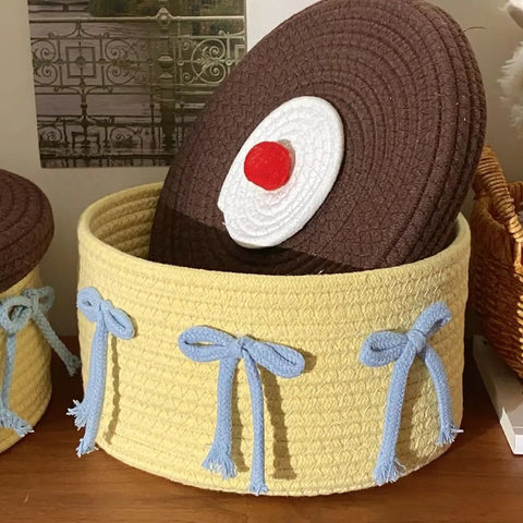 Legit Handwoven Cotton Storage Basket With Snug Dustproof Lid Solid Home Hub Organizer Perfect For Bedroom Clothes And Living Room Gear Nifty Space Saving Set Up You Will Score with blue bows and decorative lid.
