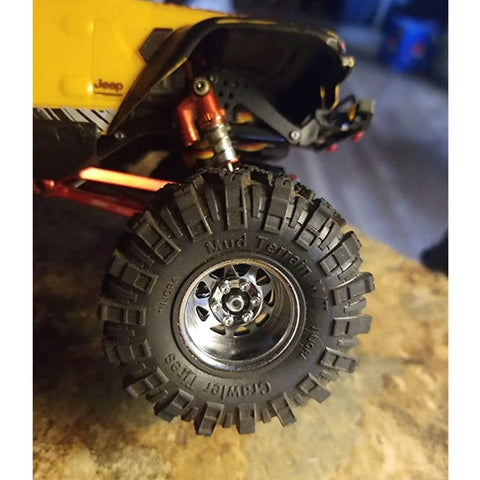 Close-up of Dope Deep Dish Stamped Steel 1.0 Beadlock Wheel For 1/18 And 1/24 RC Crawlers Silver With Internal Beadlock System