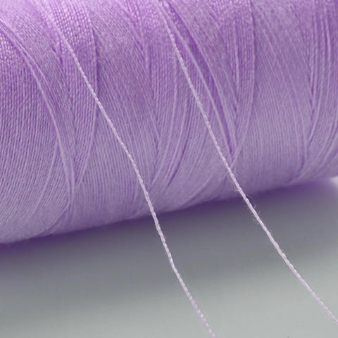 Real Deal Polyester Sewing Thread Kit With 36 Vibrant Shades And Prewound Bobbins showing lavender thread spool design.