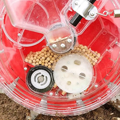 Detail of seed compartment in Metal Precision Garden Seeder With Walk Behind Design, Row Crop Planter And Lawn Spreader.