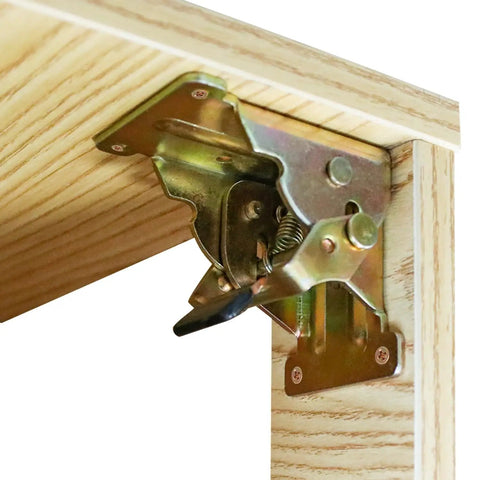 Self Locking Table Supports No Sweat Setup With Heavy Duty Folding Leg Brackets showing metal hinge on wood surface.