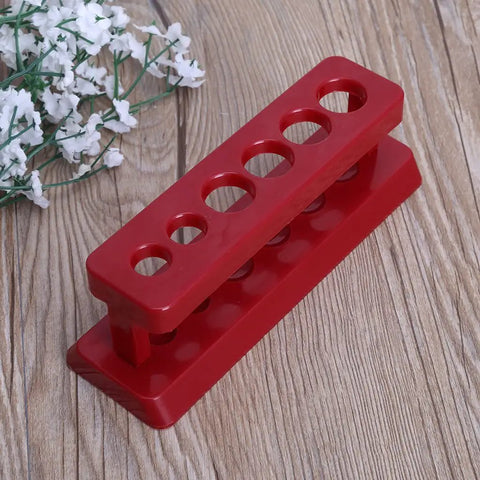 Red ABS six-hole test tube holder rack portable plastic stand for lab burette shelf, handy and student friendly lab gear.