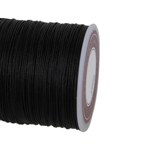 Rock Solid Waxed Thread For Leather Sewing And Bookbinding Hella Durable Half Millimeter Black Cord on spool, ideal for crafting.