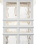 Close-up of white Beacon Square Outdoor Wall Light frame with clear hammered glass panels in Craftsman style.