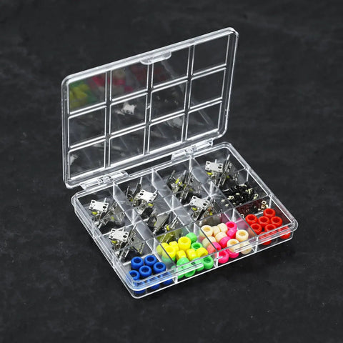 Premium Fingerboard Repair Kit Featuring 31 Millimeter Trucks Vibrant Multi Color Wheels And Heavy Duty Fasteners in a storage case.