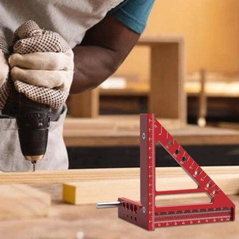 Pro Grade Aluminum Multi Angle Scribing Ruler For Woodworking shown on a carpentry workbench with a worker using a drill.
