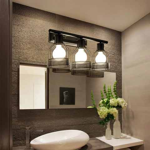 Industrial Vanity Light Plug In Three Light Retro Cage Wall Sconce With Metal Shade highlights bathroom decor above mirror.