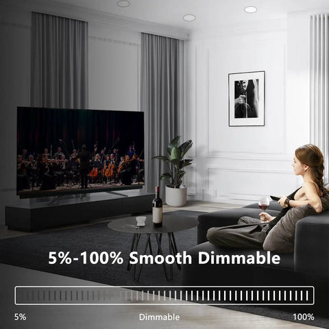Living room with dimmable 4 Inch LED Recessed Lighting Kit Canless Pot Wafer Lights, woman relaxing on couch.