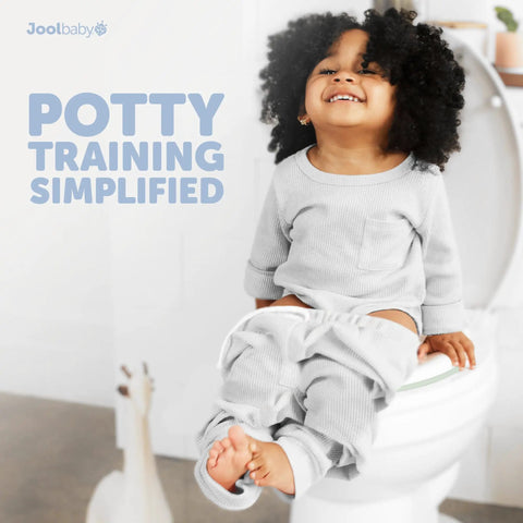 Child sitting on toilet with No Sweat Toddler Potty Training Seat Built For Smooth Transitions To The Family Toilet With Sure Grip Non Slip Base And Reliable Splash Shield Included.
