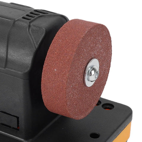 Close-up of Solid Mini Bench Grinder With Adjustable 2000 To 6000 Rpm Dial for 18V Battery Packs showing grinding disc.