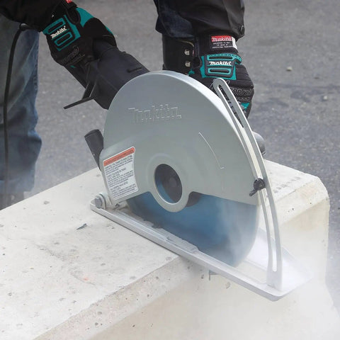 Heavy Duty 15 Amp Corded Angle Cutter With 14 Inch Super Joint System And AC Or DC Switch Removable Base For Tight Quarters Built Like A Tank For Smooth Operator Performance All Day Long Renewed Unit in action cutting concrete.
