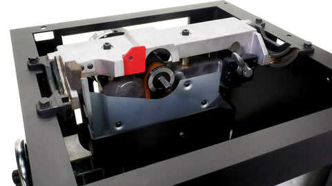 Close-up view of the Workhorse Cabinet Tablesaw Boasting A Beefy 7.5Hp Motor integrated motor and dust collection gear.
