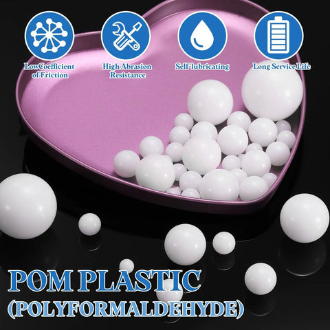 200 Piece Slick POM Plastic Bearing Balls 5 Mm Solid Roller Beads For Drawer Glides in a heart-shaped tray.