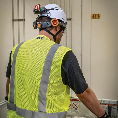 Worker wearing hard hat with dual cooling fan for hard hats and safety helmets, lightweight USB C rechargeable head neck cooler