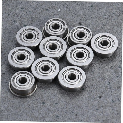 Solid 5 Pack Ball Bearing Extruder Swap For 3D Printers Fatigue Resistant Replacement Pulleys Gears on grey surface.