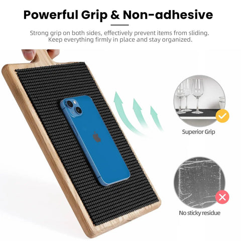 Super Thick Non Adhesive Shelf Liner For Kitchen Cabinets And Drawers Rock Solid Anti Slip Grip Heavy Duty Easy Cut Micro Foam Mat For Pantry And Bathroom Organization Black Roll on a wooden cutting board holding a smartphone.