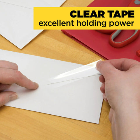 Applying Crystal Clear Office Tape That Sticks Like A Pro, Three Quarters Inch Wide By One Thousand Inches Per Roll on envelope