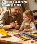 Cool 240 Pack Sand Paper Kit With 12 Grits From 80 To 2000 And Mini Finger Sander in workshop with father and daughter sanding wood.