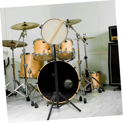 Slick Black Tripod Drum Stand With Heavy Duty Snare Rack And Practice Pad Holder Featuring Adjustable Heights Hella Portable for jamming.