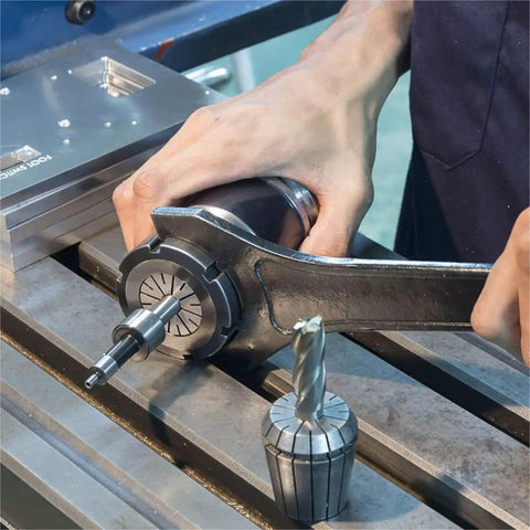 Heavy Duty Er32 Collet Chuck Set For Precision Milling Cnc Tool Holder 2 To 20 mm High Carbon Steel Clamp being used on milling machine.