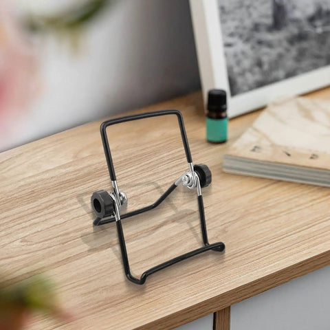 Two Pack Foldable Solar Panel Mounting Brackets With Adjustable Stands on wooden surface