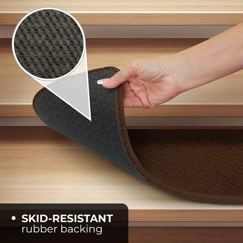 Hand demonstrating the rubber backing of a Set Of 15 Skid Resistant Carpet Stair Treads In Chocolate Brown 8 Inch By 27 Inch for non slip steps.