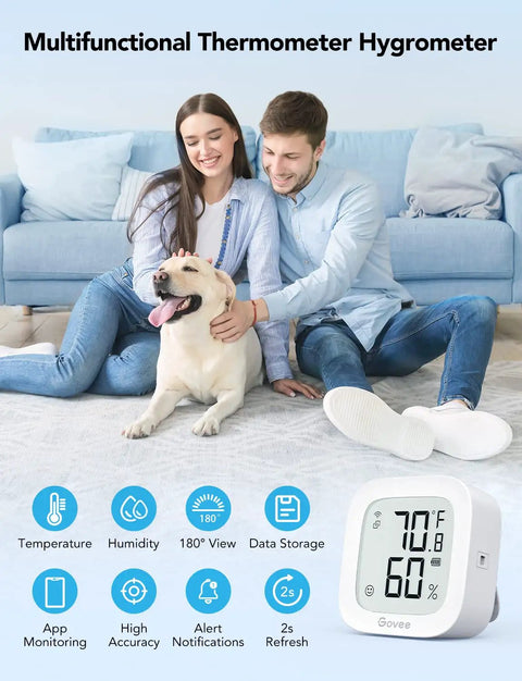 Couple with dog using WiFi Thermometer Hygrometer With E Ink Display Real Time Indoor Temperature And Humidity Sensor App Alerts
