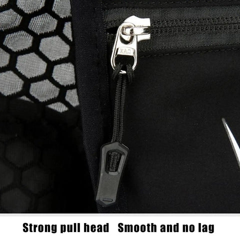 Close-up of zipper on Breathable Hydration Vest Pack For Runners With Built In Water Reservoir showing sturdy pull tab detail.